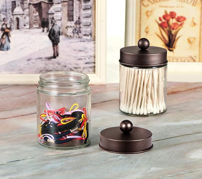 Amolliar 4 Pc Glass Apothecary Jars - Countertop Qtip Dispenser Holder with Stainless Steel Lids&Cute Stickers -Bathroom Vanity Storage Organizer Set for Qtips,Cotton Swabs/Rounds (Bronze)