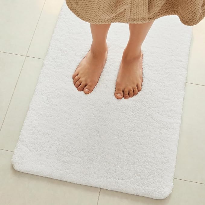 TYUU White Bathroom Rugs, Ultra Soft Bath Rugs Non Slip Washable, Super Absorbent Quick Dry Small Bath Mat with Rubber Backing for Bathroom Floor, Shower, or Sink, White 16" x 24"