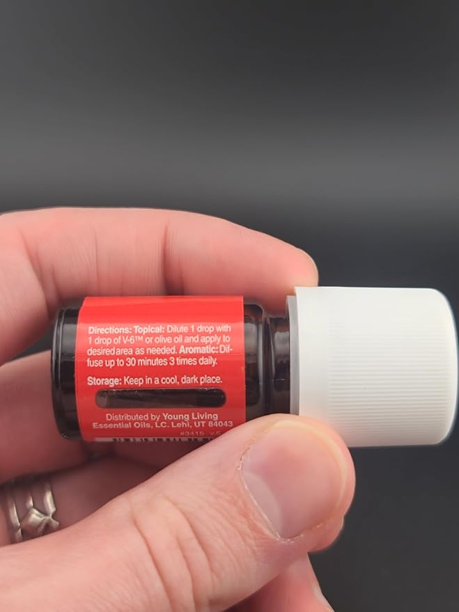 Young Living Raven Essential Oil Blend | 5 ml | Refreshing Aromatic Blend for Diffusers, Diluted Topical Use & Bath Time | Eucalyptus, Lemon, Wintergreen & Peppermint Oils | Portable Bottle