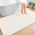 OLANLY Memory Foam Bath Mat 70x46, Super Soft Absorbent Bathroom Rugs, Quick Dry, Machine Washable Shower Floor Rugs, Bathmat Carpet, Bathroom Home Decor Accessories, Ivory