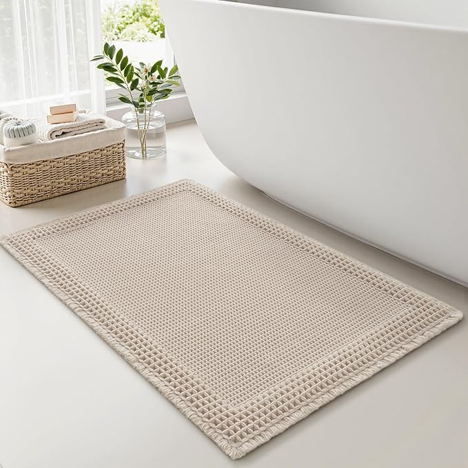 RESARE Waffle Bath Mat for Bathroom, Super Absorbent Bathroom Rugs Non Slip Machine Washable, Ultra Soft Quick Dry Boho Bath Rugs with Tassels, Farmhouse Home Decor Accessories, 17"x24" Pale Beige