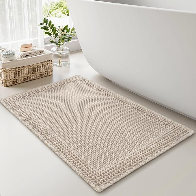 RESARE Waffle Bath Mat for Bathroom, Super Absorbent Bathroom Rugs Non Slip Machine Washable, Ultra Soft Quick Dry Boho Bath Rugs with Tassels, Farmhouse Home Decor Accessories, 24"x36" Pale Beige