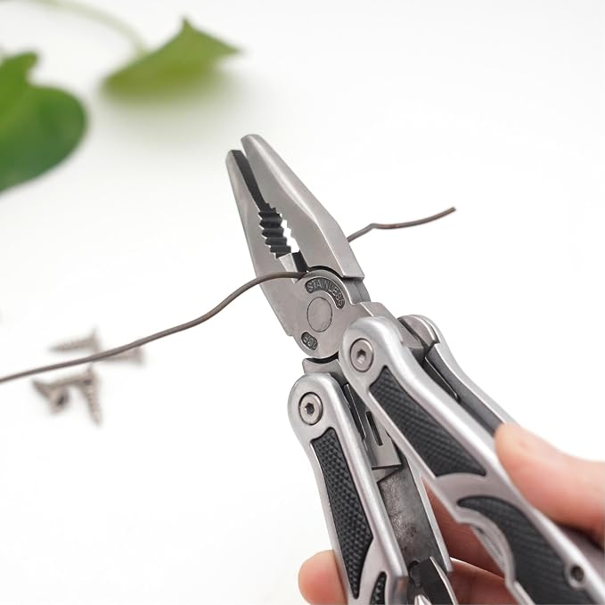 PLB027 stainless steel multi-function plier. 27 functions with knife, fish scaler, screwdrivers, can and bottle opener, 11 bits and 1 socket. Hand size and easy to carry and use indoor, outdoor