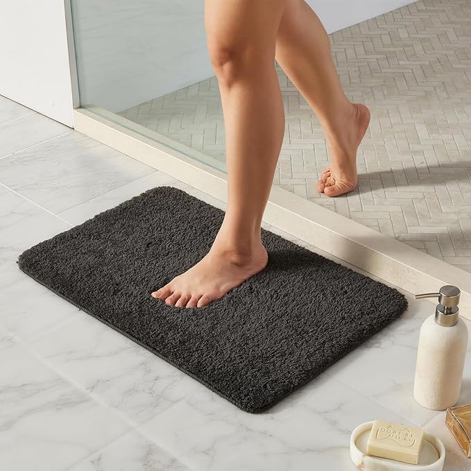 TYUU Bathroom Rugs Non Slip Washable, Ultra Soft Super Absorbent Quick Dry Small Bath Mat with Rubber Backing for Bathroom Floor, Shower, or Sink, Dark Grey 16" x 24"