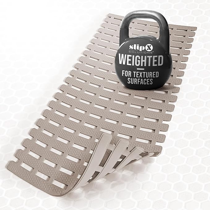 SlipX Solutions Weighted Non Slip Bath Mat for Textured Tub & Shower Surfaces, Patent Pending, Anti Slip Bathtub Safety Without Suction Cups, Doesn’t Float, Works on Tile & Stone 31” x 15”, Tan