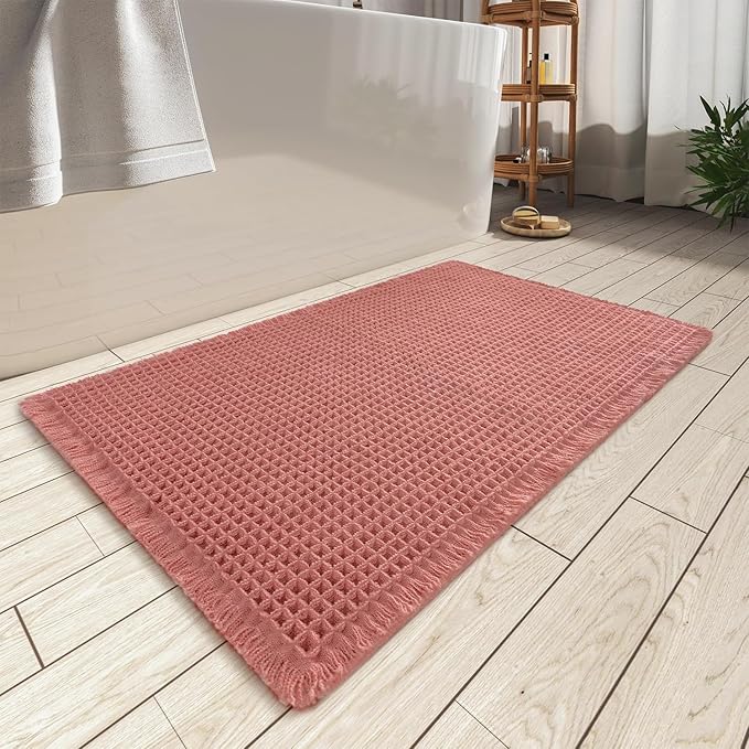 AMOAMI Upgraded Waffle Bath Mat, Super Absorbent Non Slip Bath Mats for Bathroom Floor, Washable Bathroom Rugs with Tassels, Rubber Backed Bathroom Mats, Ultra Soft, 17" x 24", Coral
