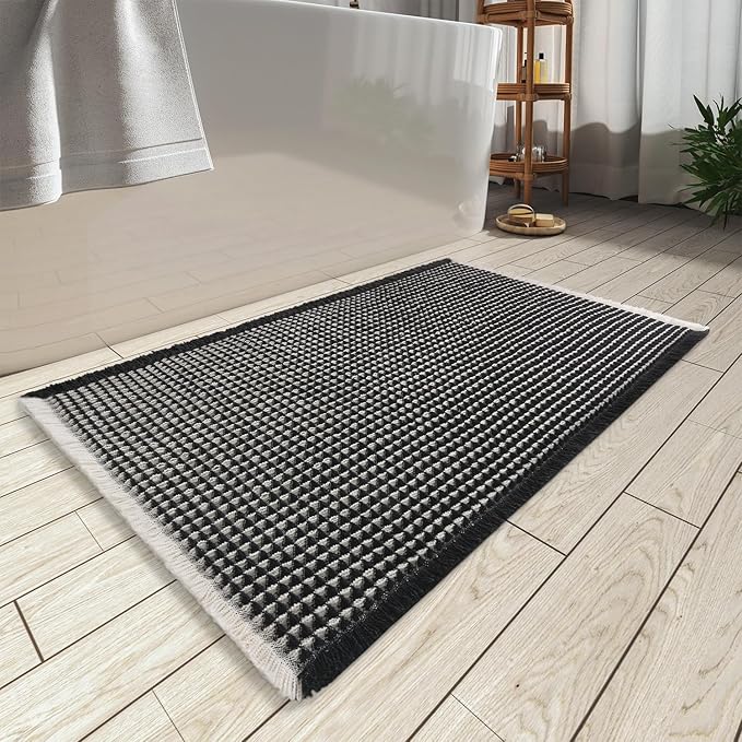 AMOAMI Upgraded Waffle Bath Mat, Super Absorbent Non Slip Bath Mats for Bathroom Floor, Washable Bathroom Rugs with Tassels, Rubber Backed Bathroom Mats, Ultra Soft, 17" x 24", Black & Cream