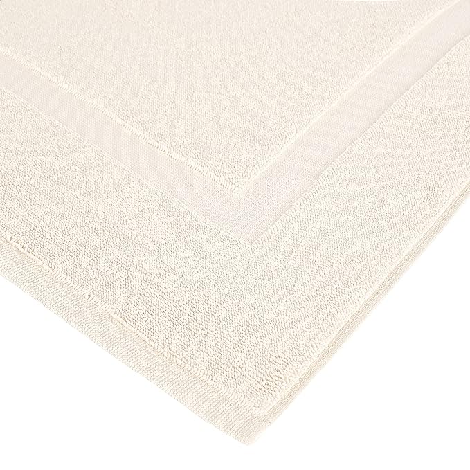 Amazon Basics Banded Bathroom Bath Rug Mat, Machine Washable, Super Absorbent, 100% Cotton, 20" W x 31" L, Cream